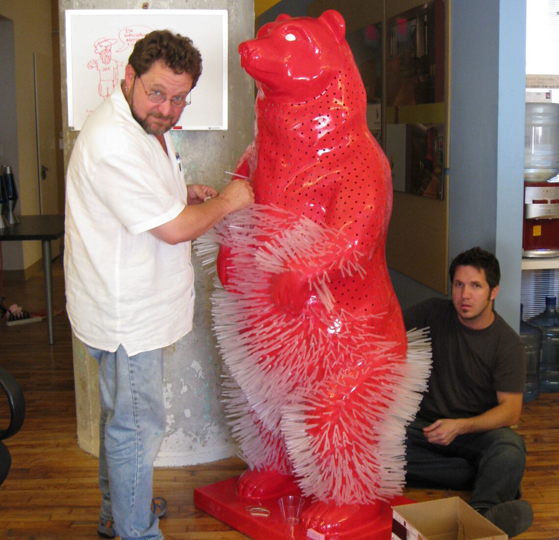 Aaron and Chris with straw bear